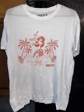 Reef Surf White Tee with Coral Hula Girl Graphic.